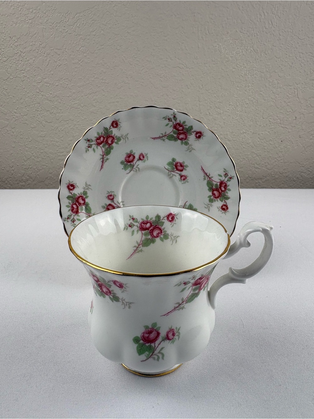 Royal Albert Bone China Teacup and Saucer Featuring the Rose Time Pattern